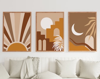 May include: Three abstract art prints in wooden frames with a brown, beige, and orange color scheme. The prints feature a sun, a moon, and a palm tree.