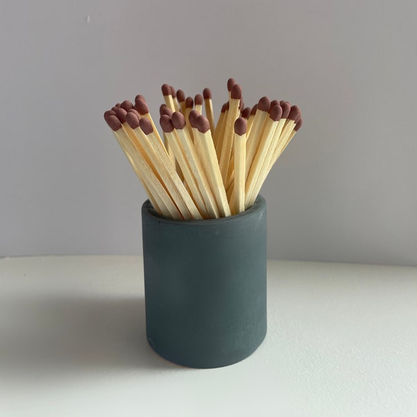 Matchstick holder with strike patch