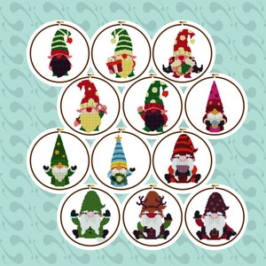 May include: Twelve round embroidery hoops with different Christmas gnomes in each. The gnomes are wearing various hats and holding different items, such as presents, candy canes, and wreaths.