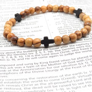 A jewelry maker will use 24 jade beads and 30 teak beads deals