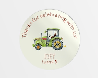 May include: Round green and white favor stickers with a cartoon green tractor and the text "Thanks for celebrating with us! JOEY turns 5".
