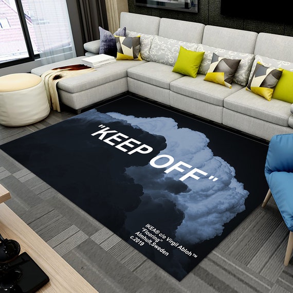 Off white ikea top rug keep off