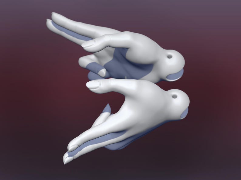 May include: Two white hands with blue accents are posed in a gesture of offering or giving. The hands are sculpted and appear to be made of ceramic.