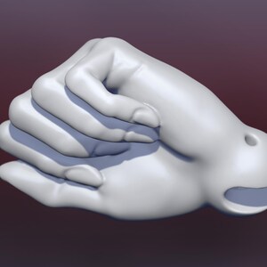 May include: A white sculpture of two hands clasped together, with the fingers intertwined. The sculpture has a smooth, matte finish and is set against a dark red background.