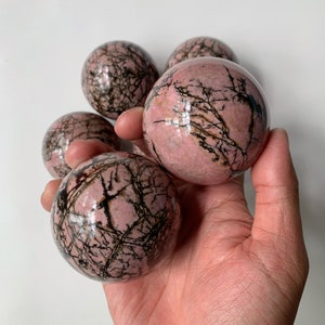 Crystal Gifts:  Pink Rhodonite Sphere - 60mm, Perfect Healing Crystal for Energy Work and Unique Gift Idea Halloween Gift
