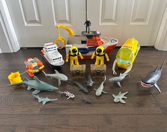 Barcos de rescate de tiburones y sets de juego de tiburones de