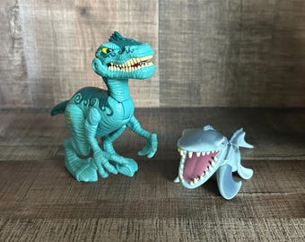 Dinosaurios Chompers de Jurassic World ~ Velociraptor y Mosasaurus, B9