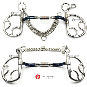 May include: Two stainless steel horse bits with a dark blue curved bar and a chain. The bits have a unique design with rounded edges and a series of holes. The brand name "TIME TRADER ENGLAND" is visible on the image.