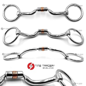 May include: Four close-up images of a silver horse bit with a copper roller. The bit has two rings on each end.
