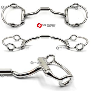 May include: A silver horse bit with a jointed mouthpiece and two loose rings on each side. The bit is designed for use with a horse's bridle.