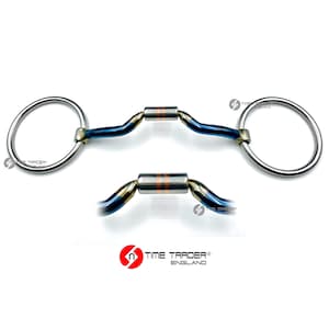 May include: A blue and silver horse bit with a copper roller. The bit has a D-ring on each end.
