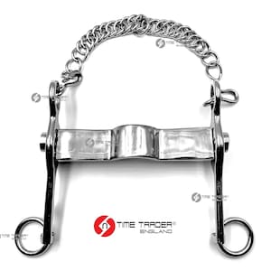 May include: A silver horse bit with a chain attached to the top. The bit has a curved mouthpiece and two rings on the sides.