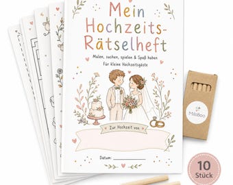 Puede incluir: Un cuaderno de actividades de boda titulado Mein Hochzeits-Rätselheft con ilustraciones de novios, un pastel y anillos. El set incluye una caja de cartón marrón con lápices de colores y una etiqueta circular que indica 10 piezas.