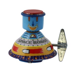 Jouet en tôle - robot - Robot spatial - robot en tôle à remontoir
