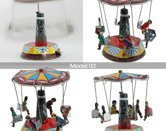 Carrusel de juguete de hojalata, columpio, pequeña feria, carrusel