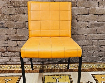 Chaise skaï jaune année 70'