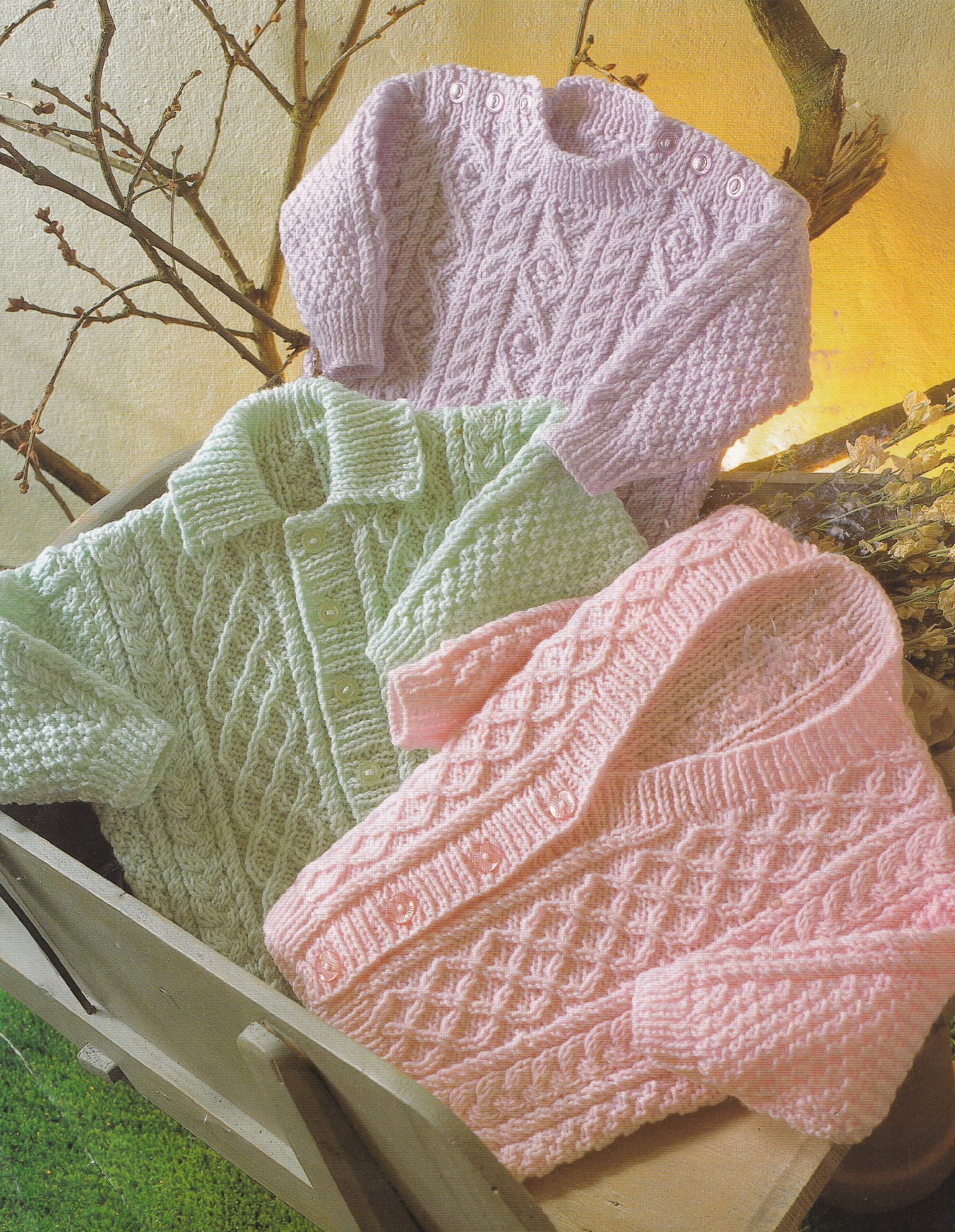 knitting pattern for baby cardigans and sweater with cables