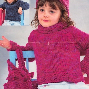 May include: A pink knitted jumper with a matching hat and bag. The jumper has a turtleneck and long sleeves. The hat is a beanie style with a fold-over brim. The bag is a small tote bag with a single handle.