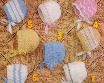 vintage knitting pattern for a collection of gorgeous baby bonnets