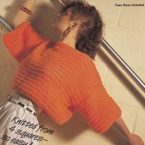 May include: Orange knitted jumper with a ribbed texture. The jumper is cropped and has a wide, round neckline. The text "Knitted from 4 squares - so easy & quick" is written on the bottom of the image. The text "71-97 cm 28-38 in Teen Sizes included" is written in the top right corner of the image.