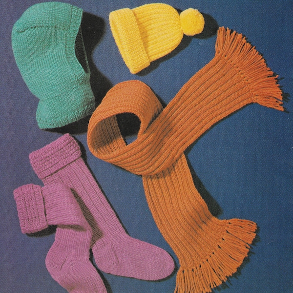 vintage knitting pattern for a collection of chiders accessories including socks, balaclava scarf and pompom hat - dk yarn