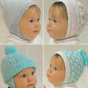 May include: Four babies wearing different knitted baby hats. The hats are in various colors and patterns, including blue, white, pink, and turquoise. Some hats have pom-poms or other decorative elements.