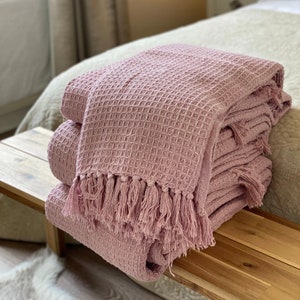 Pale pink knitted throw hot sale