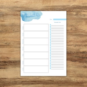 May include: Printable weekly meal planner with a blue watercolor background. The planner includes a section for each day of the week and a grocery list.