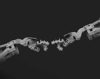 Könnte beinhalten: Ein 3D-gedruckter Roboterarm mit mehreren Gelenken und Segmenten, der so konzipiert ist, dass er die Bewegung eines menschlichen Arms nachahmt. Der Arm befindet sich in einer Pose, als würde er nach einem anderen Objekt greifen.