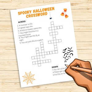 May include: A printable Halloween crossword puzzle with a spider, bats, candy corn, and a spider web. The crossword puzzle has clues for words like "monster", "ghost", "trick-or-treater", and "pumpkin".