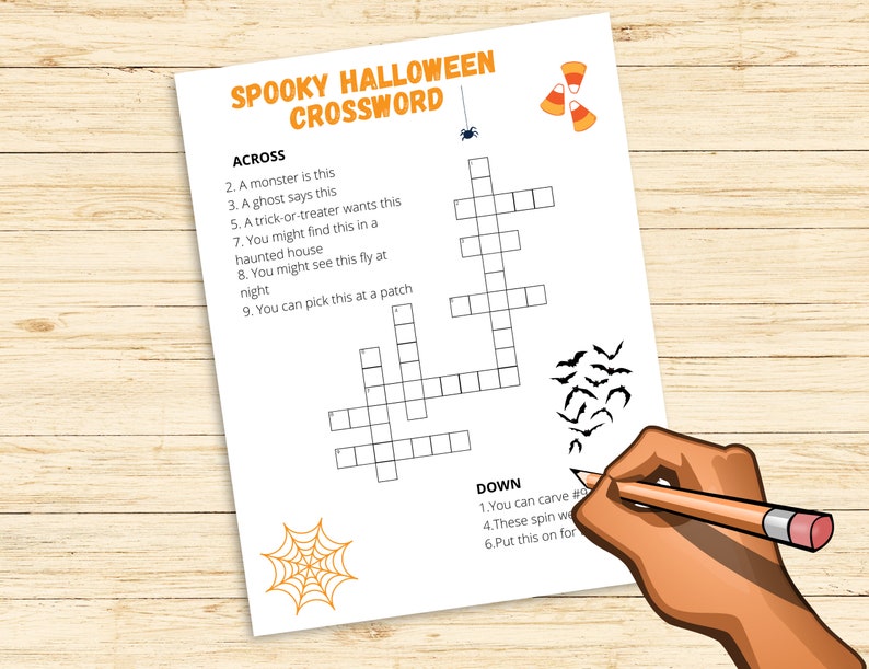 May include: A printable Halloween crossword puzzle with a spider, bats, candy corn, and a spider web. The crossword puzzle has clues for words like "monster", "ghost", "trick-or-treater", and "pumpkin".