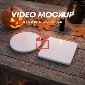 May include: Two blank ceramic coasters, one circular and one square, both featuring a smooth white glossy surface. The coasters are positioned on a wooden surface alongside a lit jack-o'-lantern, autumn leaves, a black candle, and a dark mug.