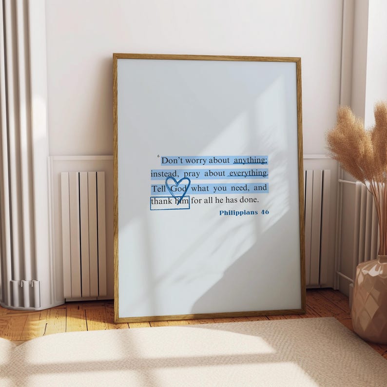 May include: A framed print with a blue and white quote about prayer and gratitude. The quote reads "Don't worry about anything: instead, pray about everything. Tell God what you need, and thank him for all he has done." The quote is attributed to Philippians 46.