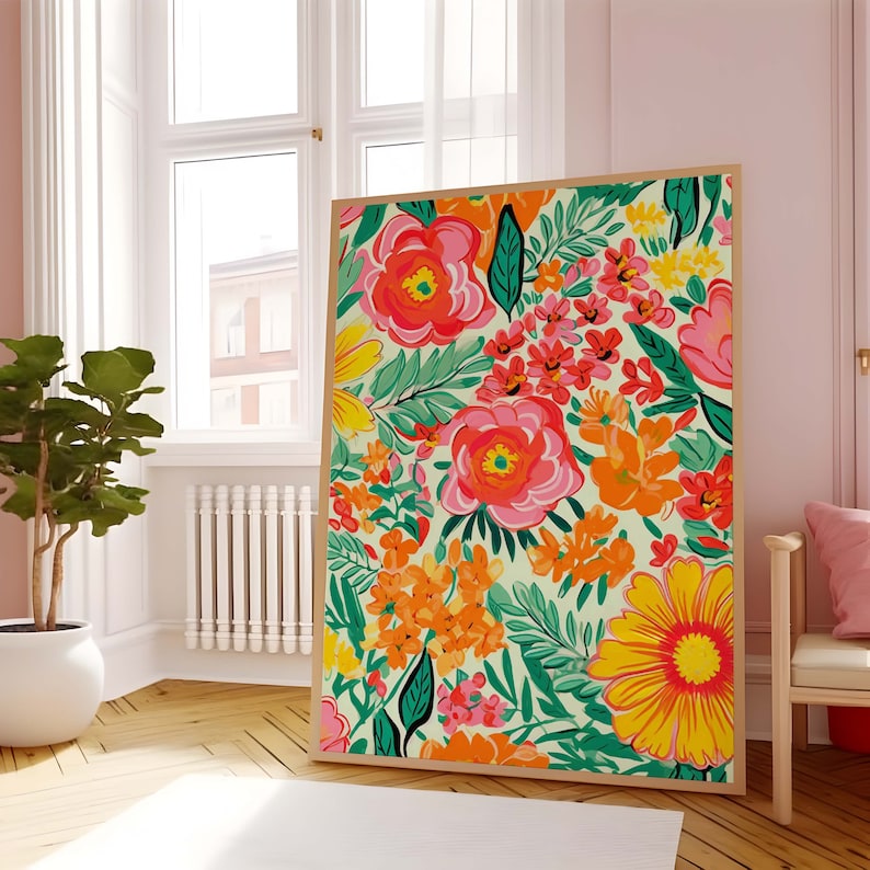 May include: A framed print featuring a colorful floral pattern with pink, red, orange, yellow, and green flowers on a light green background.
