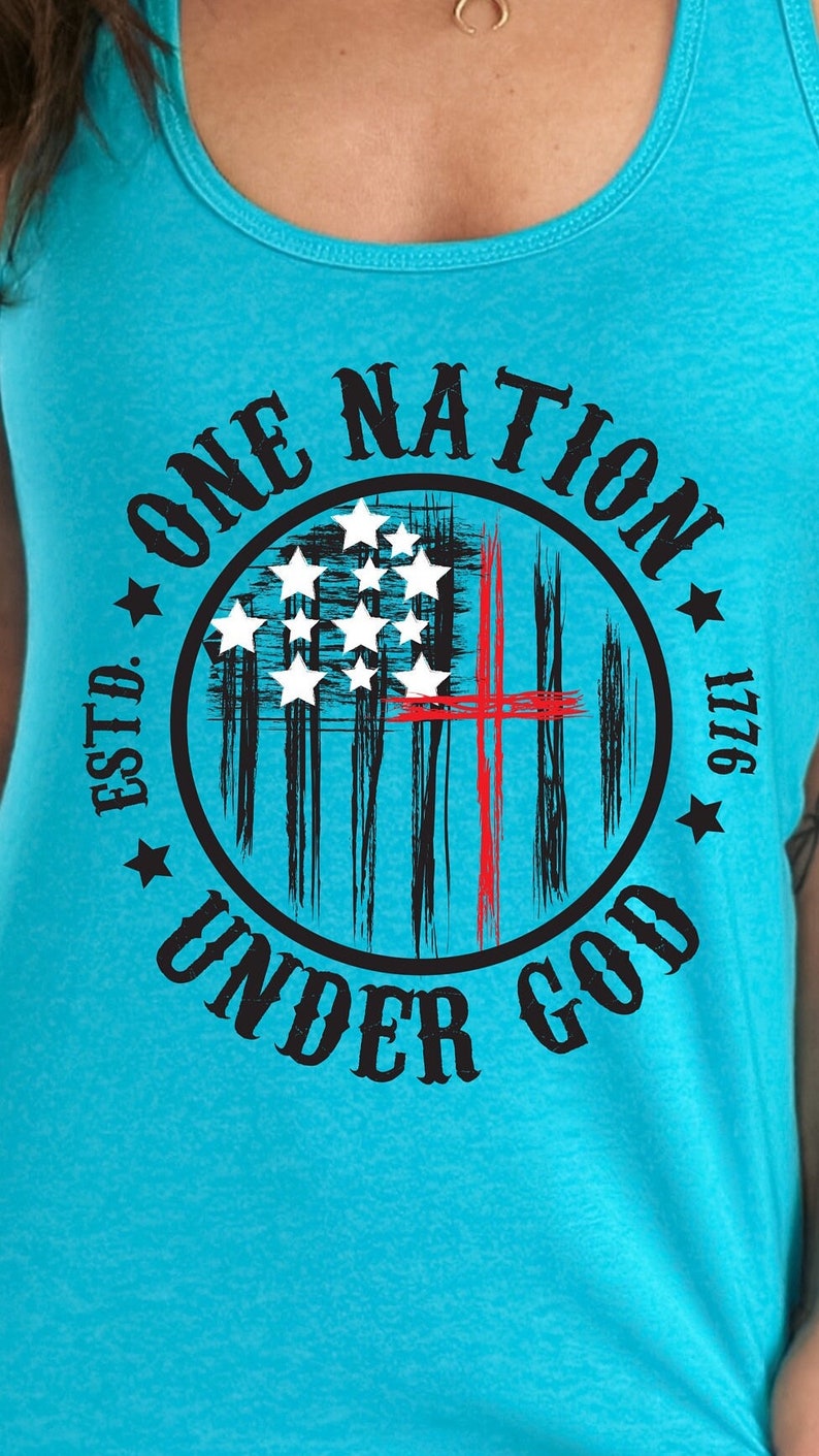 May include: A turquoise blue tank top with a black and white graphic of an American flag with a red cross superimposed over it. The graphic is in a circle with the text "ONE NATION UNDER GOD ESTD. 1776" around it.