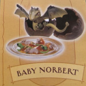 May include: A fantasy illustration of a baby dragon hatching from a dark brown egg. The dragon is green and yellow with small wings. Below is a plate of food with small creatures. The text "BABY NORBERT" is at the bottom.