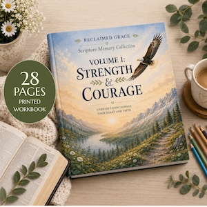 May include: A 28-page printed workbook titled Reclaimed Grace Scripture Memory Collection Volume 1: Strength & Courage. The cover features a bald eagle flying over a mountain landscape with a lake, forest, and sunrise, with 5 verses to encourage.