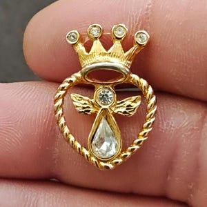 May include: A rustic wooden sign with the text "Welcome to our home" in white lettering. The sign features a distressed finish and a simple, inviting design, perfect for a front porch or entryway.