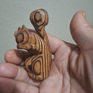 Hand Carved Black Oak Wooden Squirrel with Nut Figurine