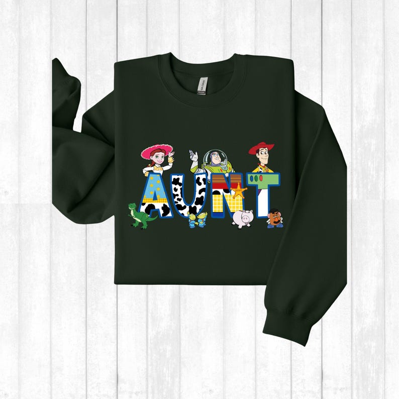 a green shirt with a cartoon character on it