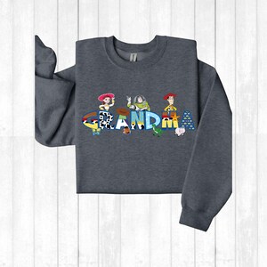 a gray shirt with the word land written on it