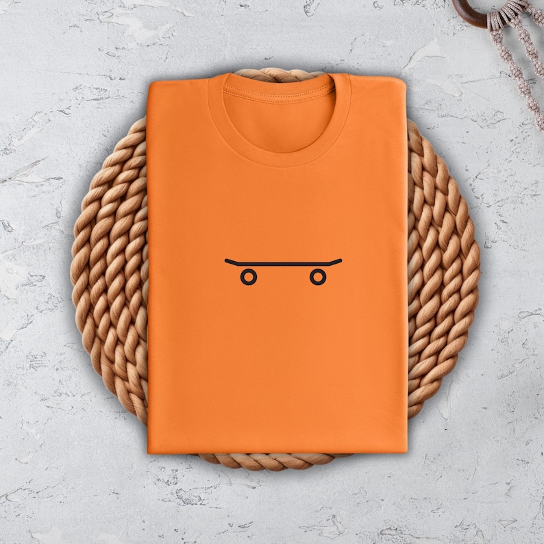 a t - shirt with a skateboard drawn on it
