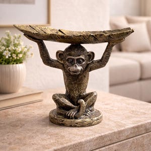 May include: A set of three ceramic mugs with a speckled, matte finish. The mugs are in shades of cream, light gray, and dark gray. Each mug has a simple, minimalist design, perfect for coffee or tea.