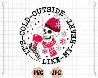 May include: A black and white skull wearing a red and white knit hat and scarf, holding a red and white coffee cup. The skull is surrounded by snowflakes and hearts. The text around the skull reads "It's cold outside like my heart".