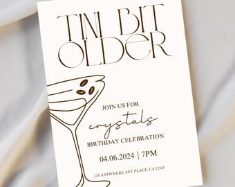 May include: A white birthday invitation with brown text that reads "Tin Bit Older" and a line drawing of a martini glass with coffee beans. The text also includes "Join us for crystals Birthday Celebration 04.06.2024 | 7PM 123 Anywhere Any Place, CA 12345".