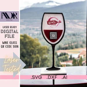 May include: A black wine glass-shaped sign with a red wine fill and a QR code. The sign reads "It's wine o'clock" and "Wine Glass QR Code Sign". The sign is laser tested and available as a digital file in .SVG, .DXF, and .AI formats.