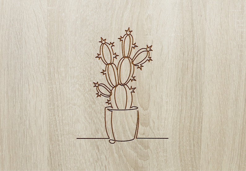 Pu&ograve; includere: Disegno a linea di una pianta di cactus in un vaso su uno sfondo di legno.