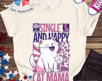 Pode incluir: Uma camiseta branca com um gráfico rosa e azul de um gato com o texto "#5 Cat Rescue Single and Happy My Mom's the Best! Cat Mama".