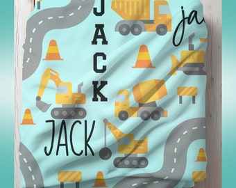 Spersonalizowany kocyk dla dziecka z pojazdem budowlanym: pamiątka z imieniem
