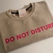 do not disturb crewneck sweater main image 1